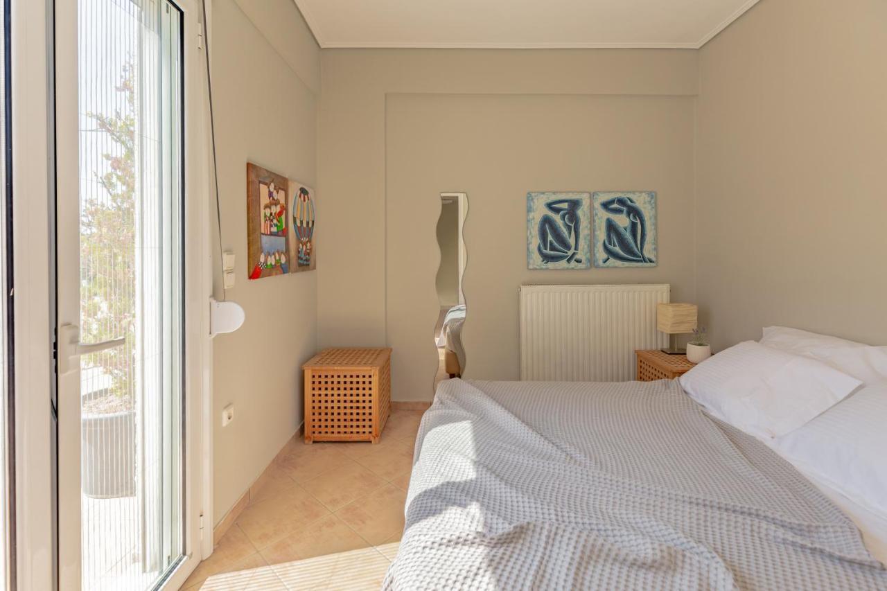 Windsurfing Seaside Apartment Artemida Esterno foto